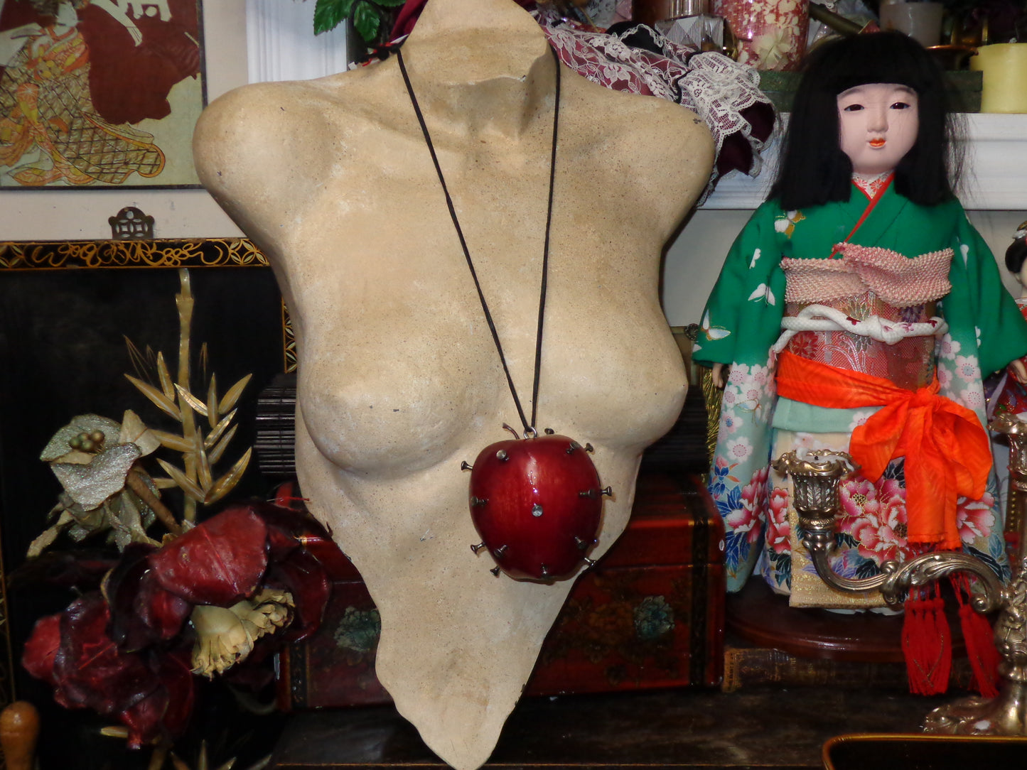 large nailed apple necklace