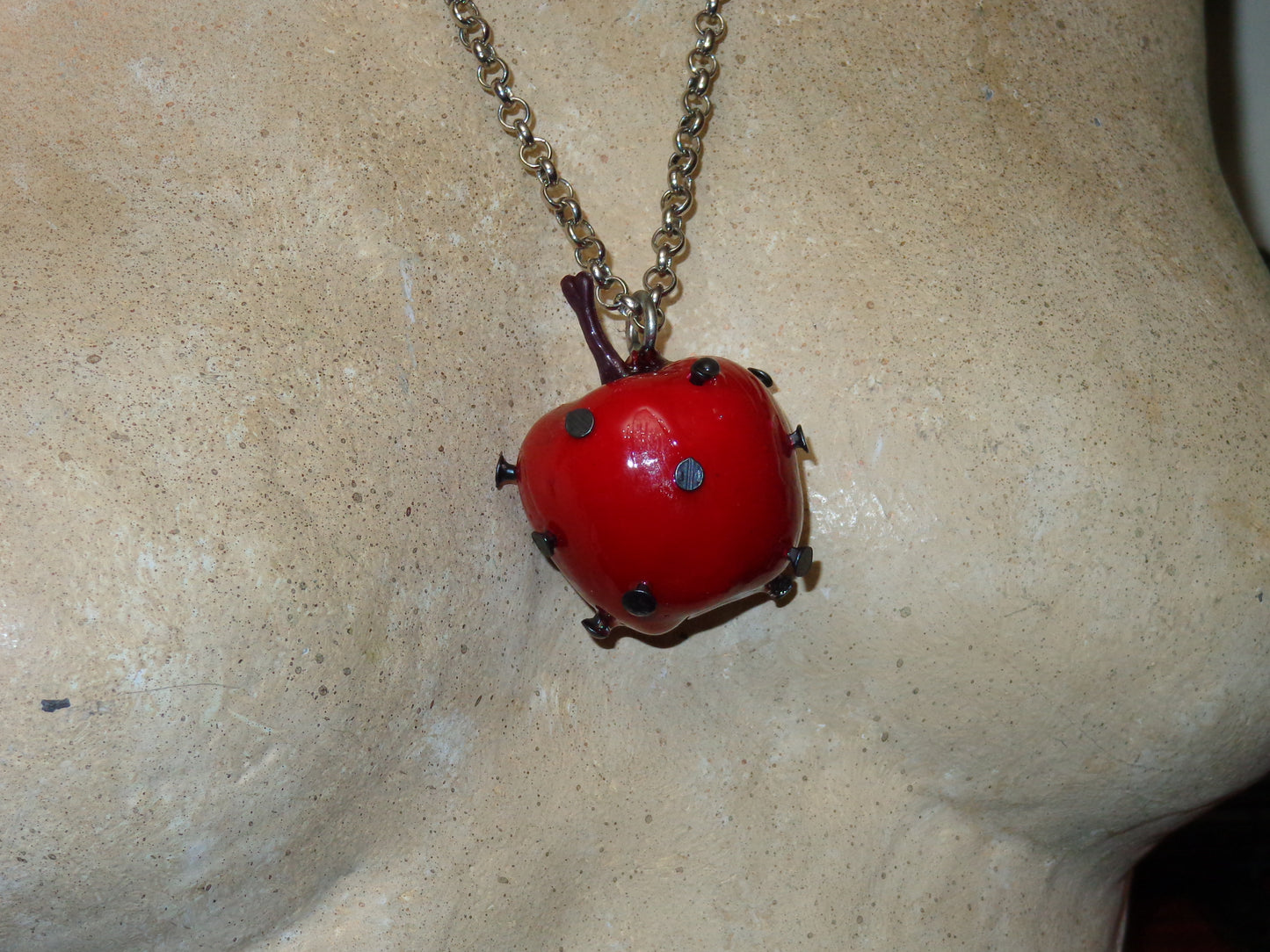 nailed apple necklaces