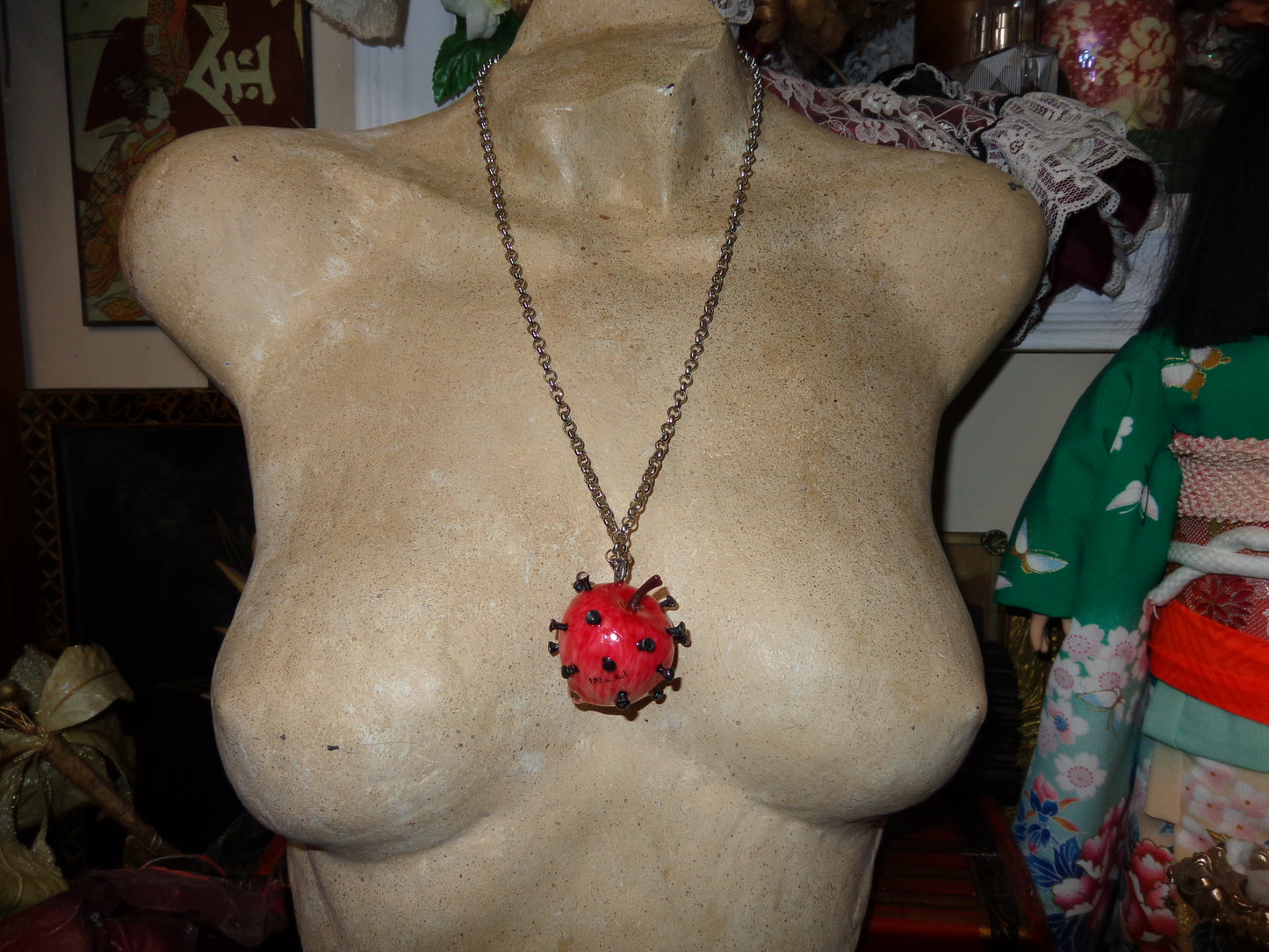 nailed apple necklaces