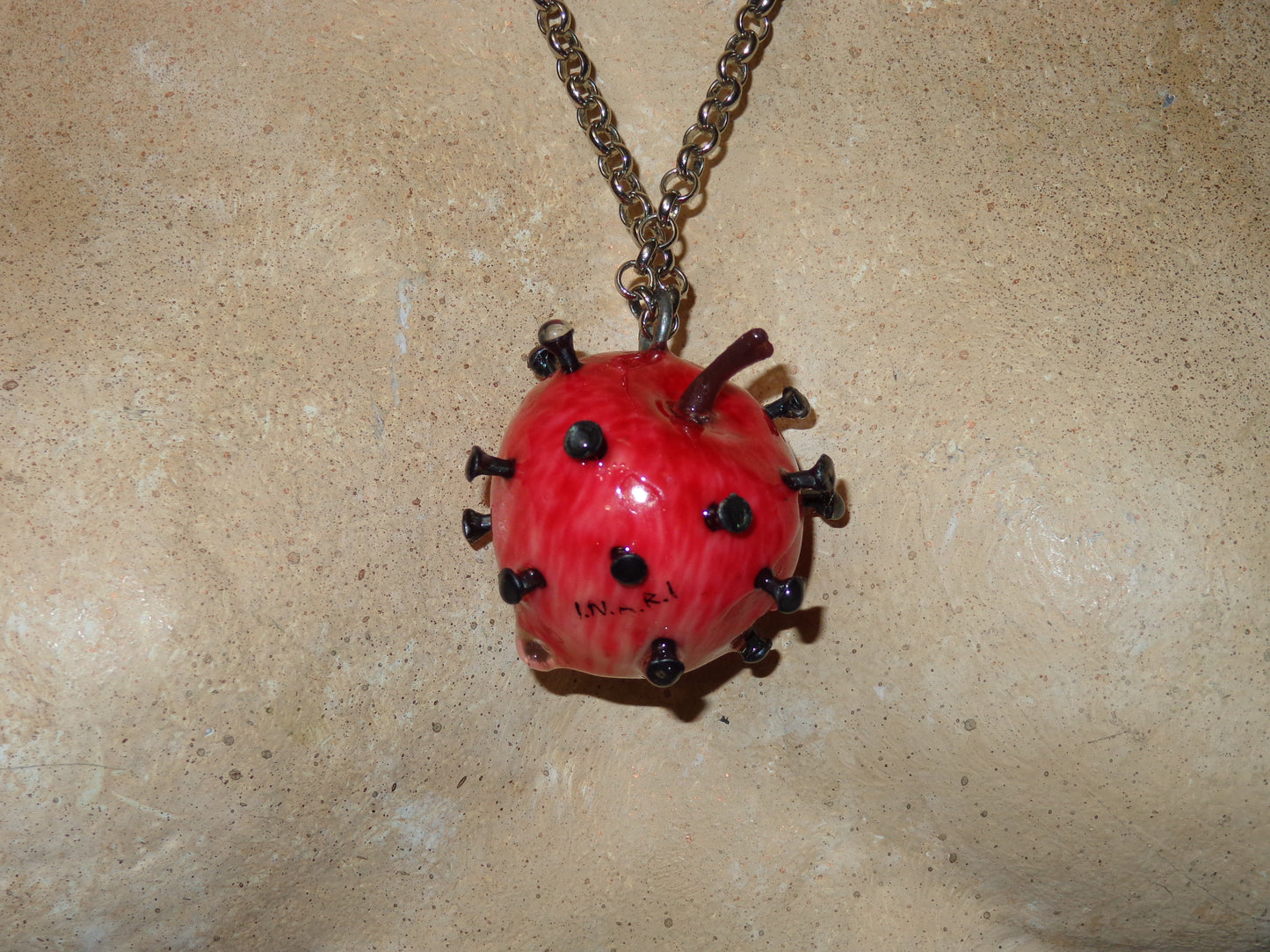 nailed apple necklaces